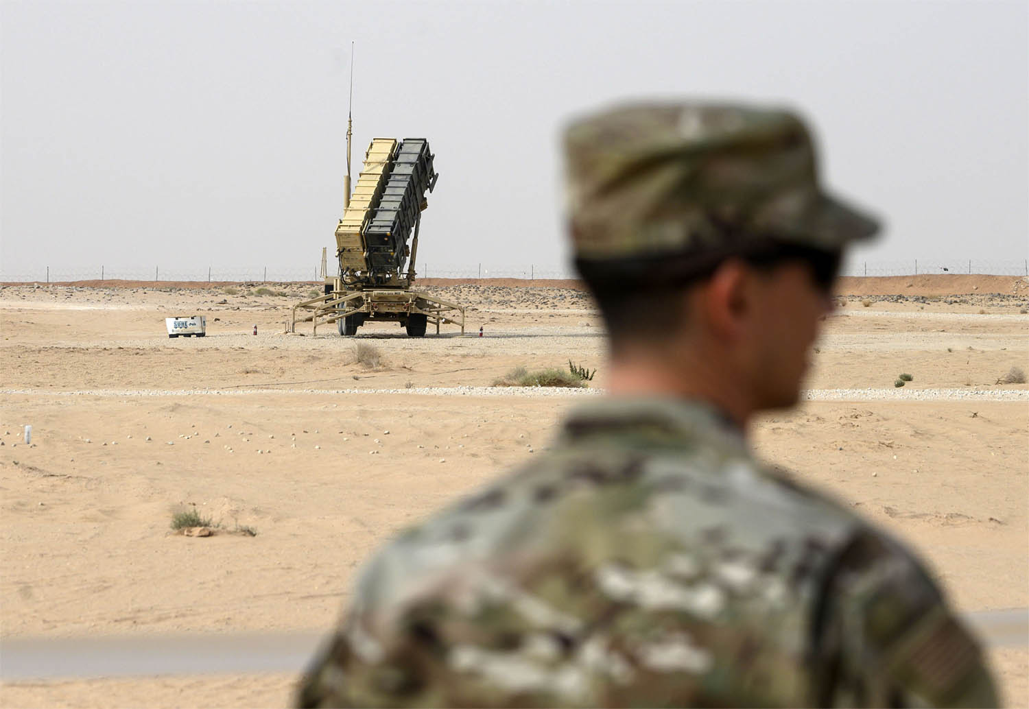 A US soldier stands near a Patriot missile battery at the Prince Sultan air base in al-Kharj, central Saudi Arabia