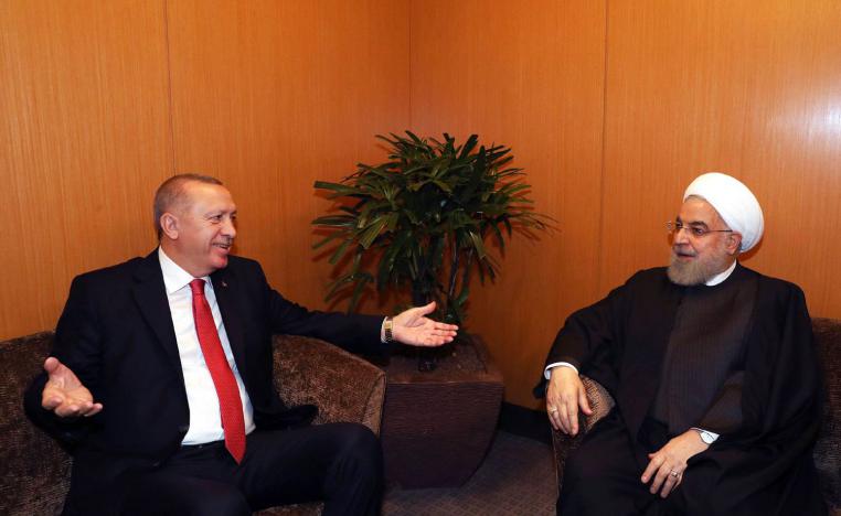 الرئيسان التركي رجب طيب أردوغان والإيراني حسن روحاني في لقاء في القمة الإسلامية في ماليزيا (2019)