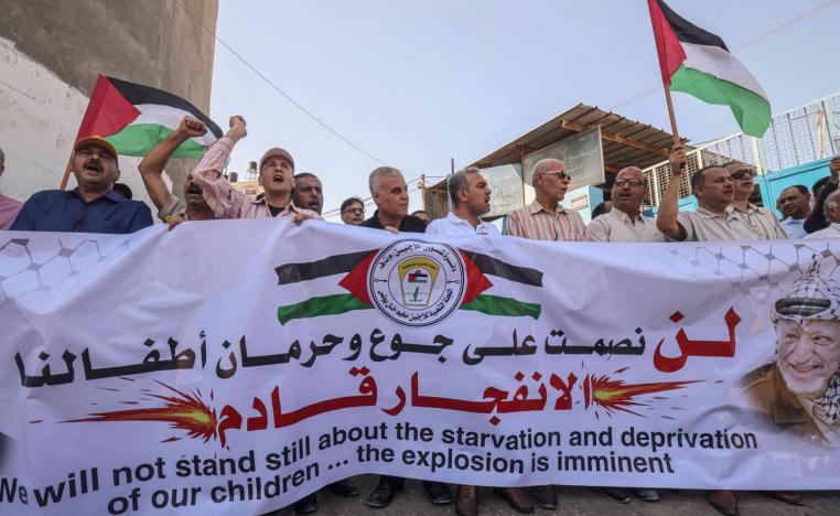 تظاهرة فلسطينية أمام مكتب الأمم المتحدة في مخيم خان يونس بغزة