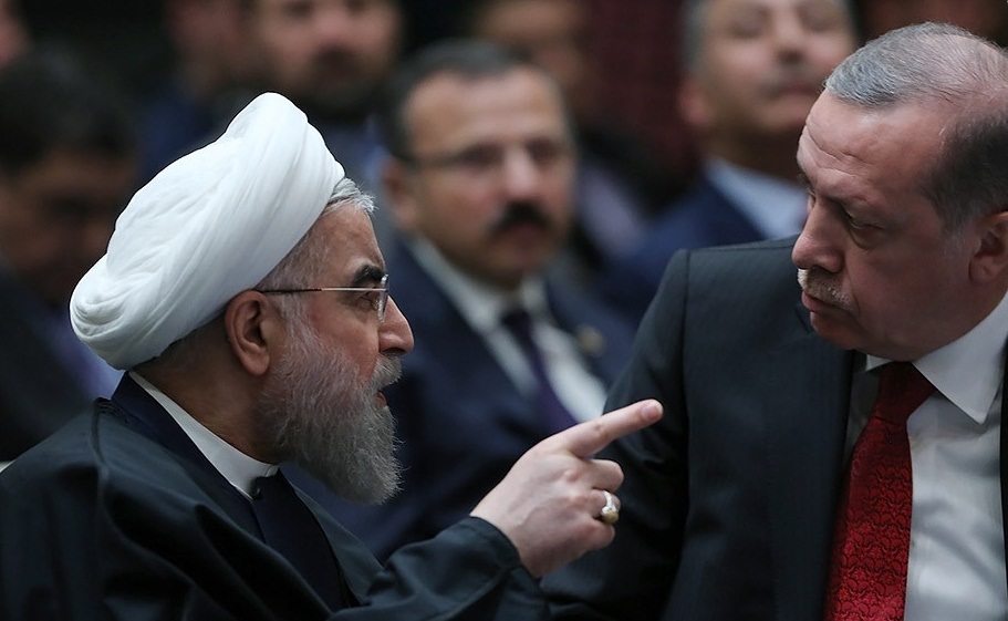 الرئيس التركي رجب طيب اردوغان ونظيره الإيراني حسن روحاني