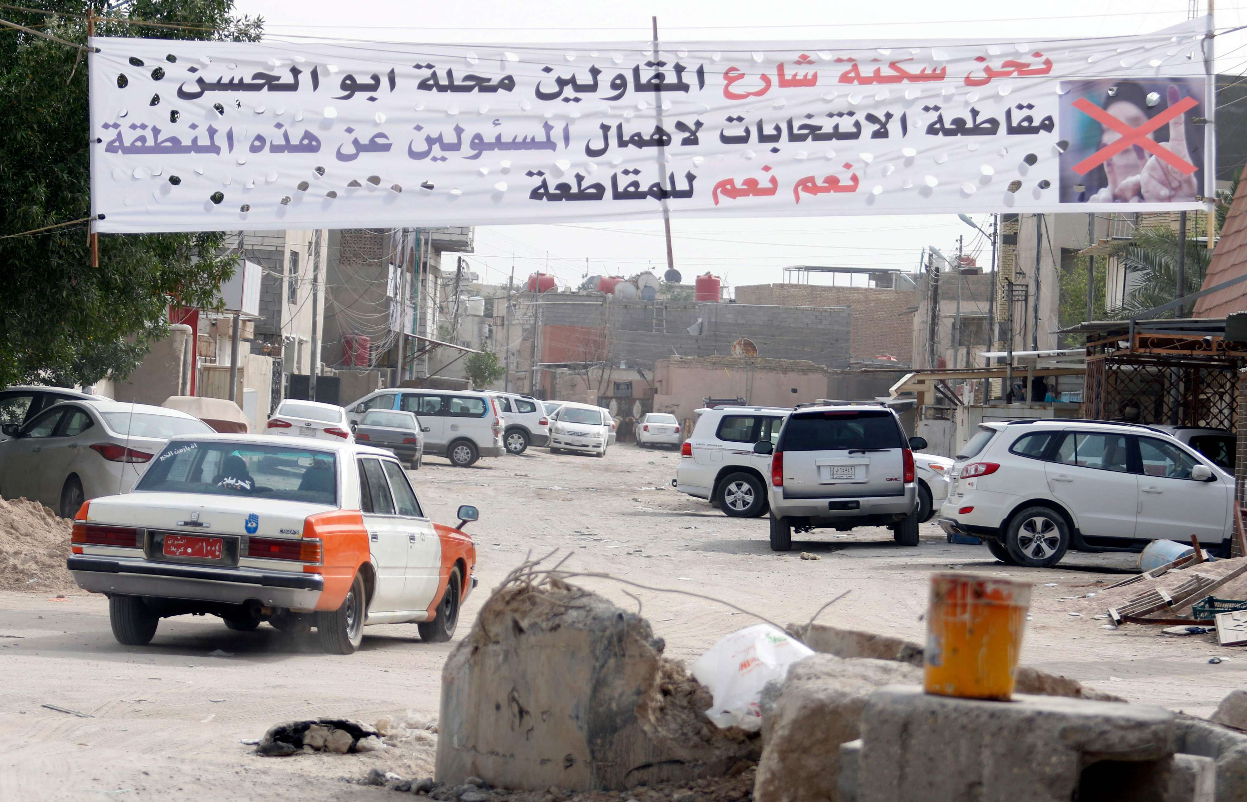 اعلانات في شوارع العراق تدعو إلى مقاطعة الانتخابات