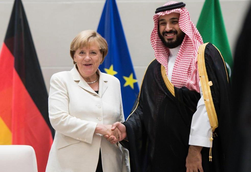 German Chancellor Angela Merkel shaking hands with Saudi Crown Prince Mohammed bin Salman 