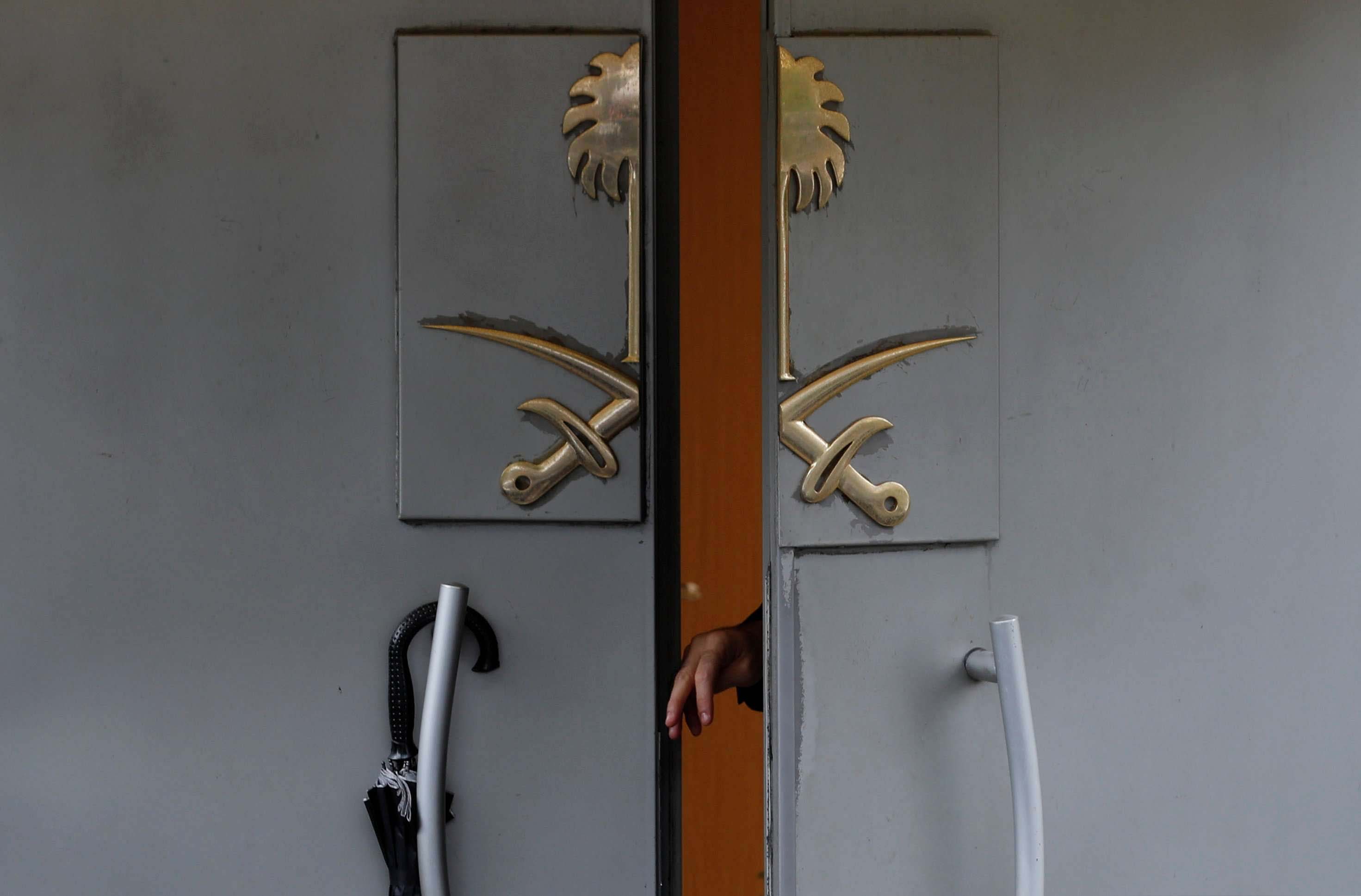 A member of security staff opens the entrance of Saudi Arabia's consulate in Istanbul, Turkey October 15, 2018