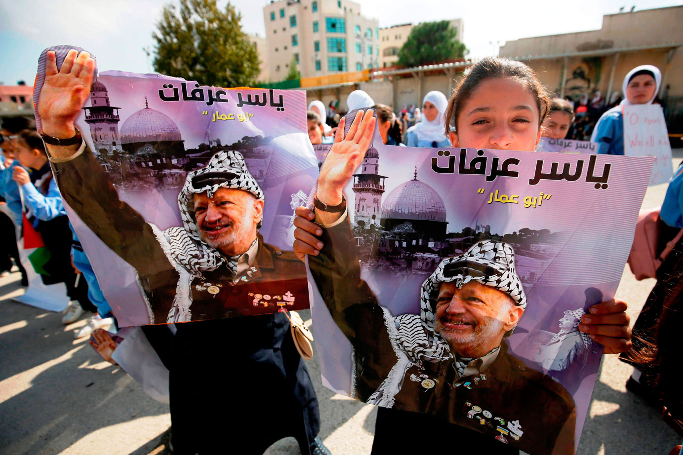 الفلسطينيون يفتقدون الوحدة في الذكرى الرابعة عشر لرحيل عرفات