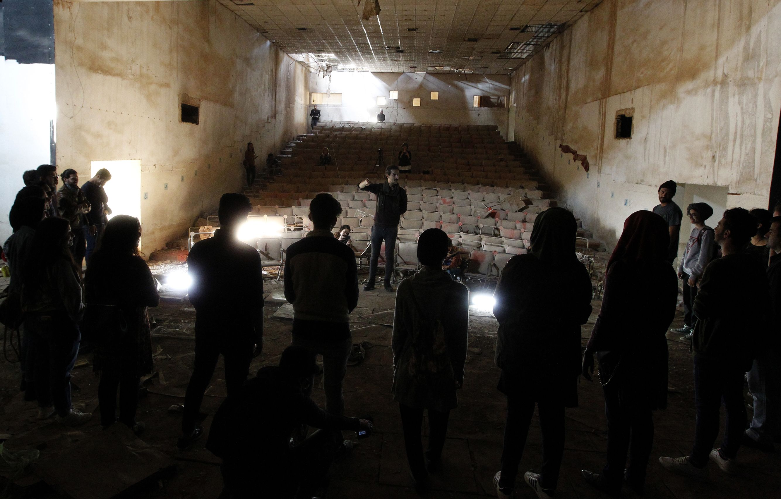 Artists practise at the Abu Nuwas Theatre that was destroyed in 2003 during the war in the Iraqi capital Baghdad on November 17, 2018.