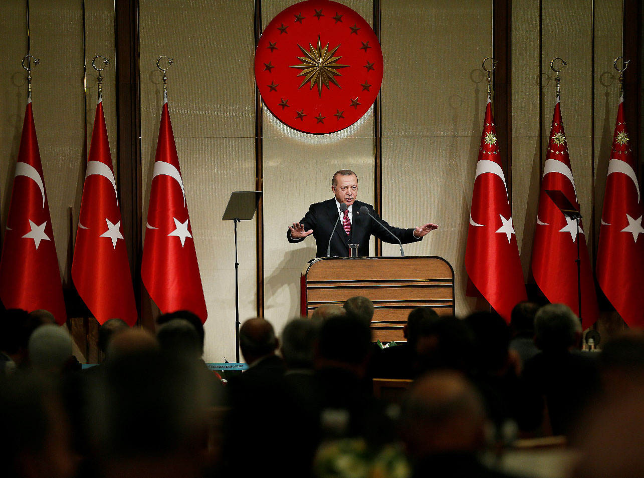Turkish President Tayyip Erdogan makes a speech during his meeting with mukhtars at the Presidential Palace in Ankara, Turkey, November 21, 2018.