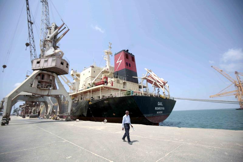 A cargo ship is docked at the port of Hodeidah in Yemen