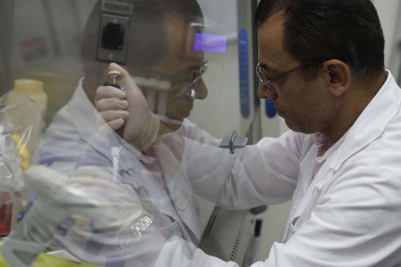 A professor in pharmaceutical sciences performs an in vitro test at a laboratory in the Lebanese American University (LAU) branch near Byblos. 