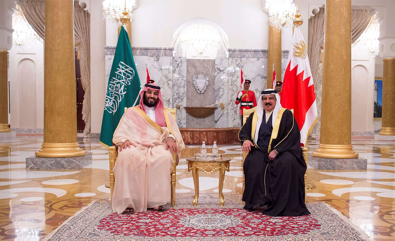 Saudi Arabia's Crown Prince Mohammed bin Salman Al Saud is received by Bahraini King Hamad bin Isa Al Khalifa in Manama