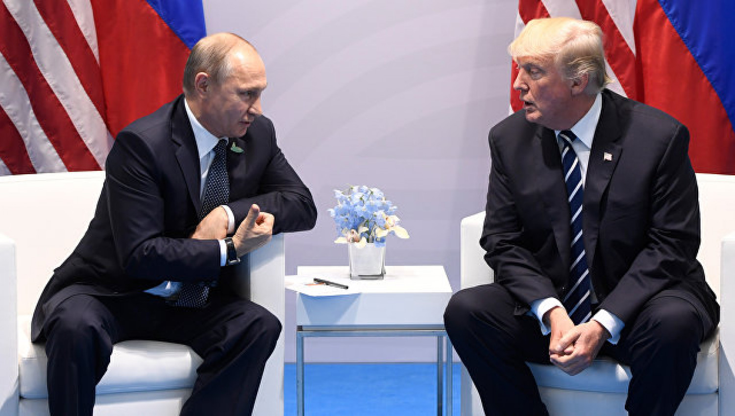 الرئيسان الأميركي دونالد ترامب والروسي فلاديمير بوتين في أول لقاء سابق بينهما