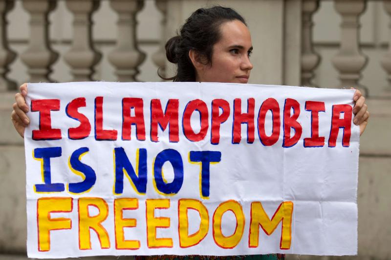 A protester participates in an anti-Islamophobia demonstration in London