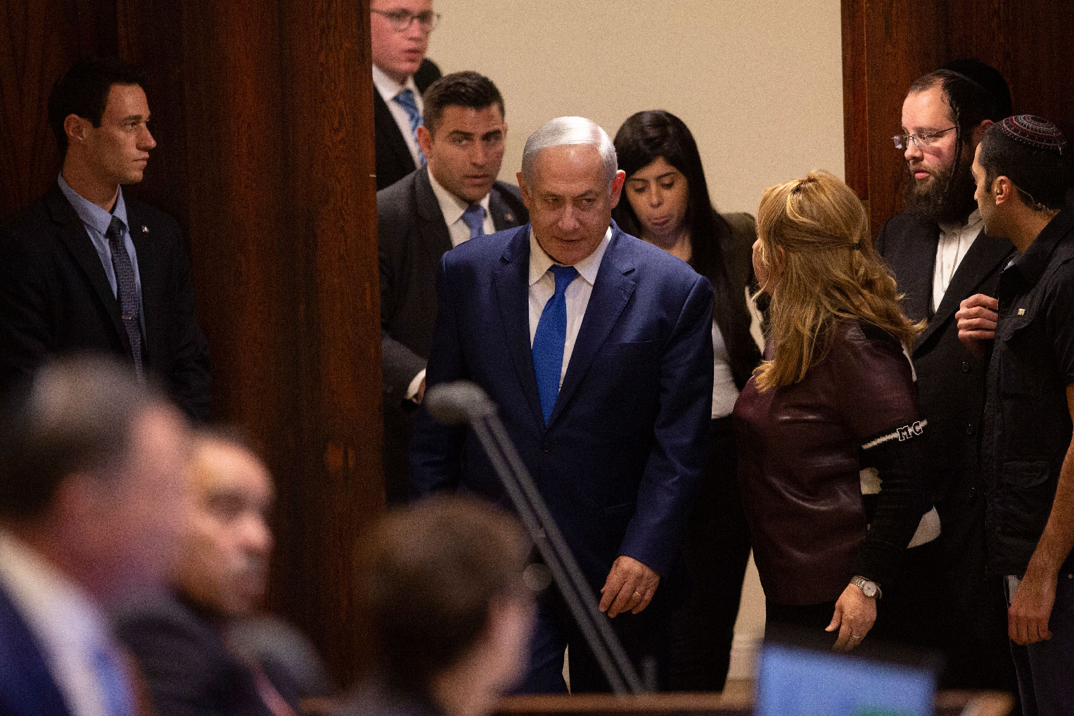 Israeli Prime Minister Benjamin Netanyahu walks in during a session at the Knesset, Israel's parliament in Jerusalem, Wednesday, Dec. 26, 2018.