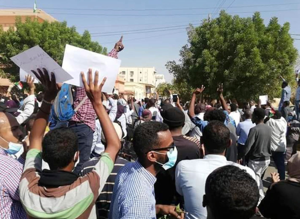 People chant slogans during a demonstration in Khartoum, Sudan on Dec. 25, 2018.