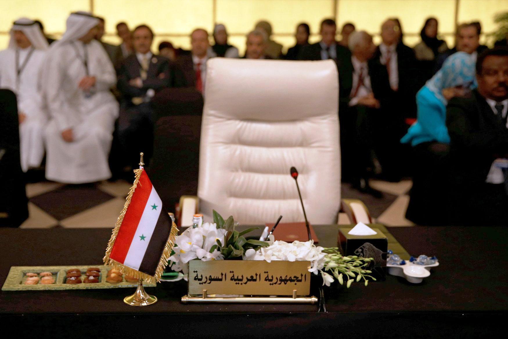 مقعد سوريا شاغرا منذ قرار الجامعة العربية تجميد عضوية دمشق في نوفمبر 2011