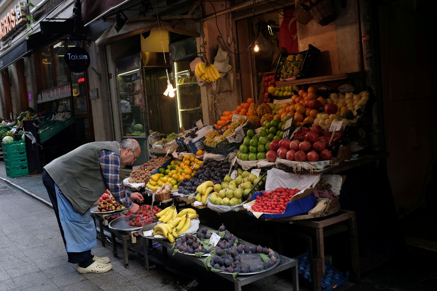 A vendor displays fruits in his shop in a local market in central Istanbul, Turkey October 9, 2018.