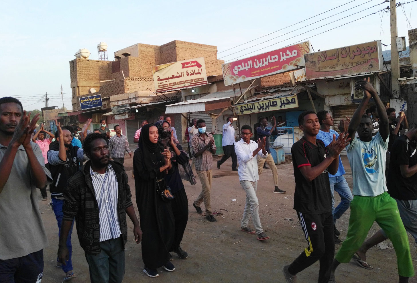 A picture taken on January 15, 2019 shows anti-government demonstrators in the Sudanese capital Khartoum's southern business district of El-Kalakla.