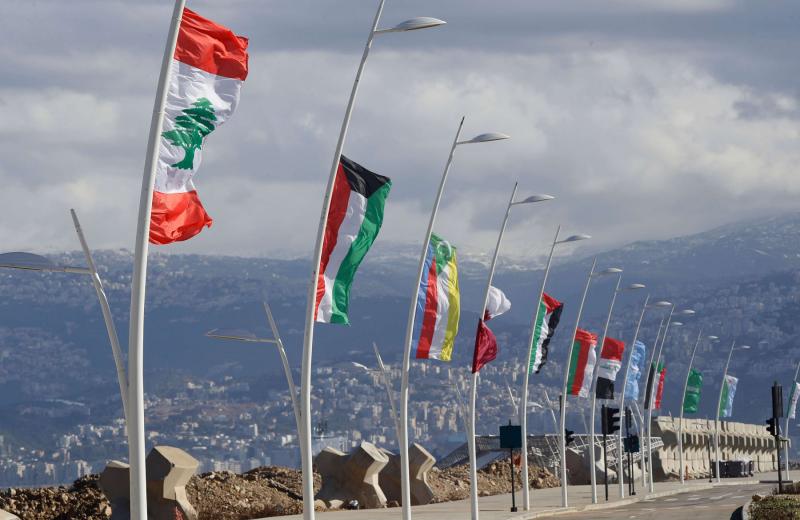 Overwhelmingly ceremonial. Flags of the Arab League members on display ahead of the Arab Economic and Social Development Summit in Beirut, January 17.
