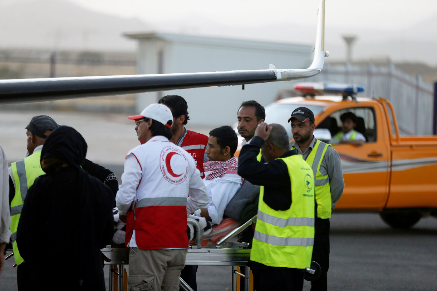 Saudi prisoner Moussa Awaji is taken on a stretcher to an ICRC plane at the Sanaa airport after he was released by the Huthis in Sanaa, Yemen January 29, 2019.