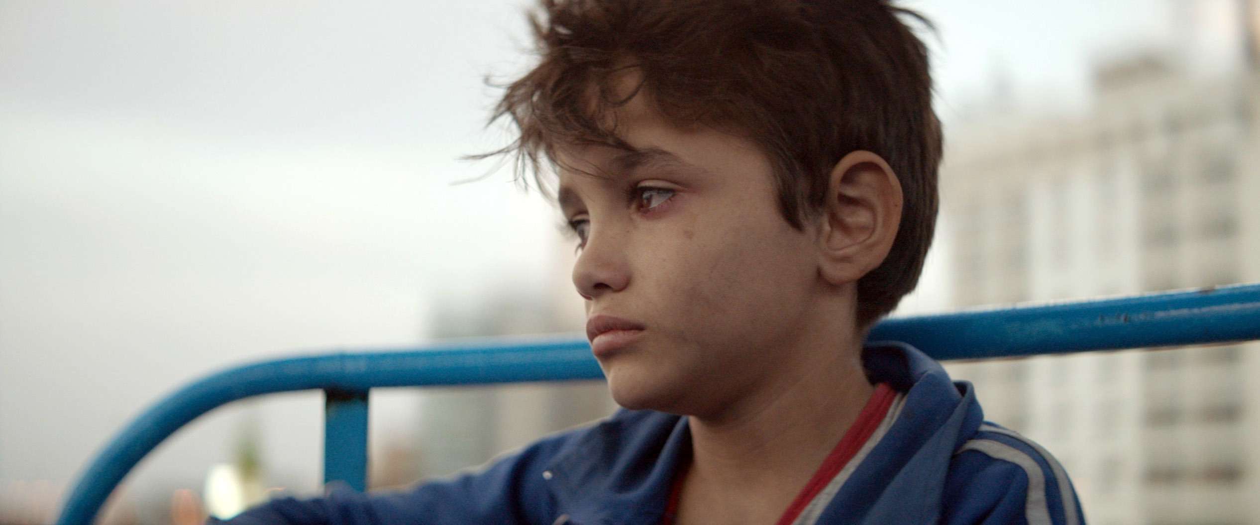 The protagonist is played by a young Syrian refugee, while another young cast member was thrown in jail during the shoot