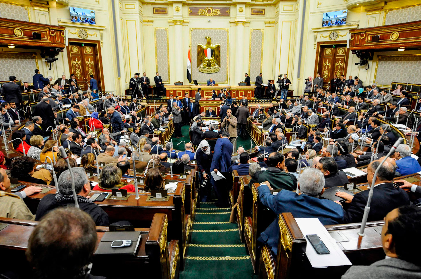 Egypt's Parliament Speaker Ali Abdel-Aal (C) chairs a parliament plenary session to deliberate the proposed constitutional amendments to increase office term durations for the country's president from four to six years, in the capital Cairo on February 14, 2019.