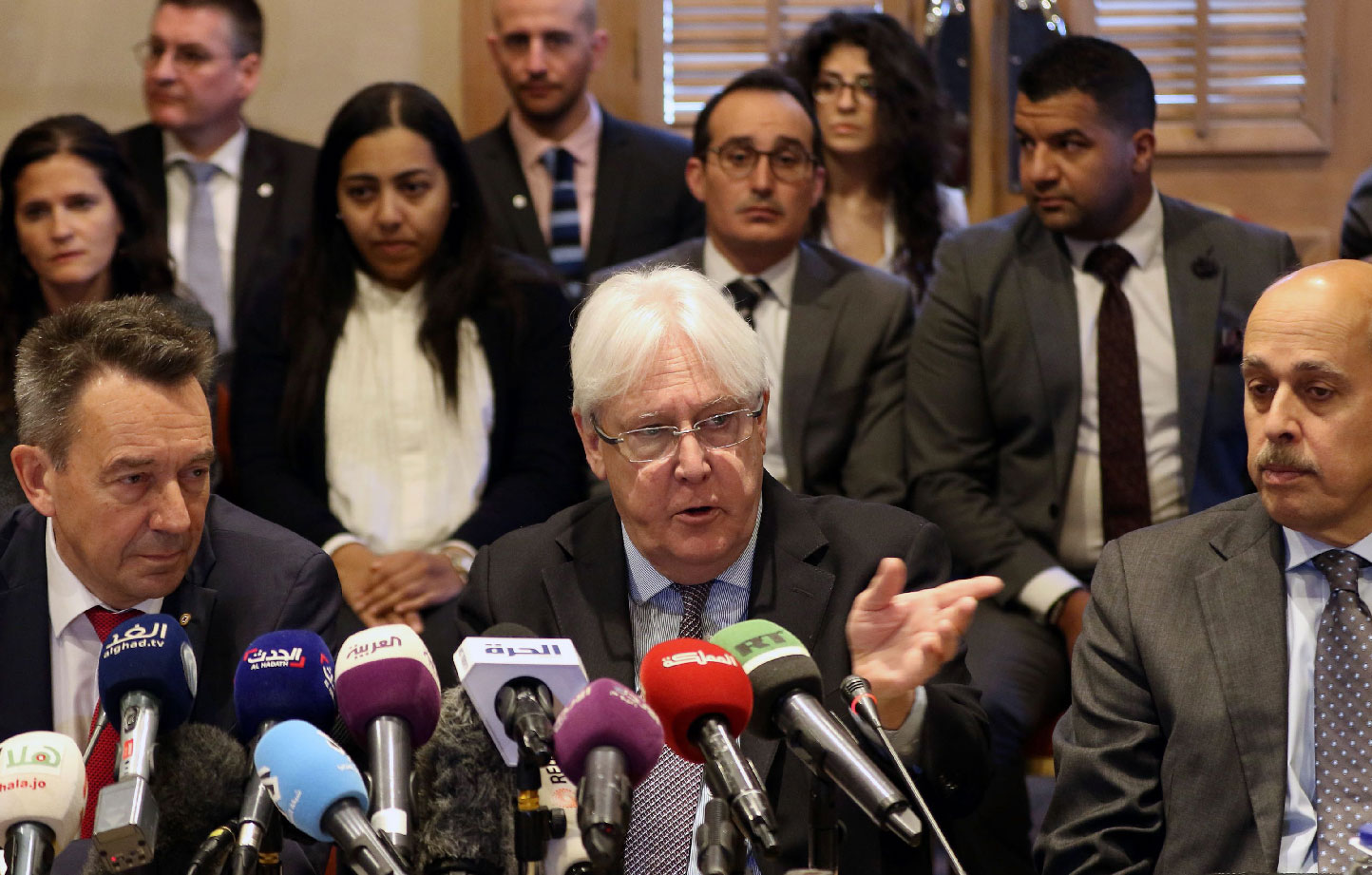 United Nations Special Envoy to Yemen Martin Griffiths (C) and International Committee of the Red Cross President Peter Maurer (L) attend a new round of talks by Yemen's warring parties on prisoners swap on February 5, 2019 in Amman.