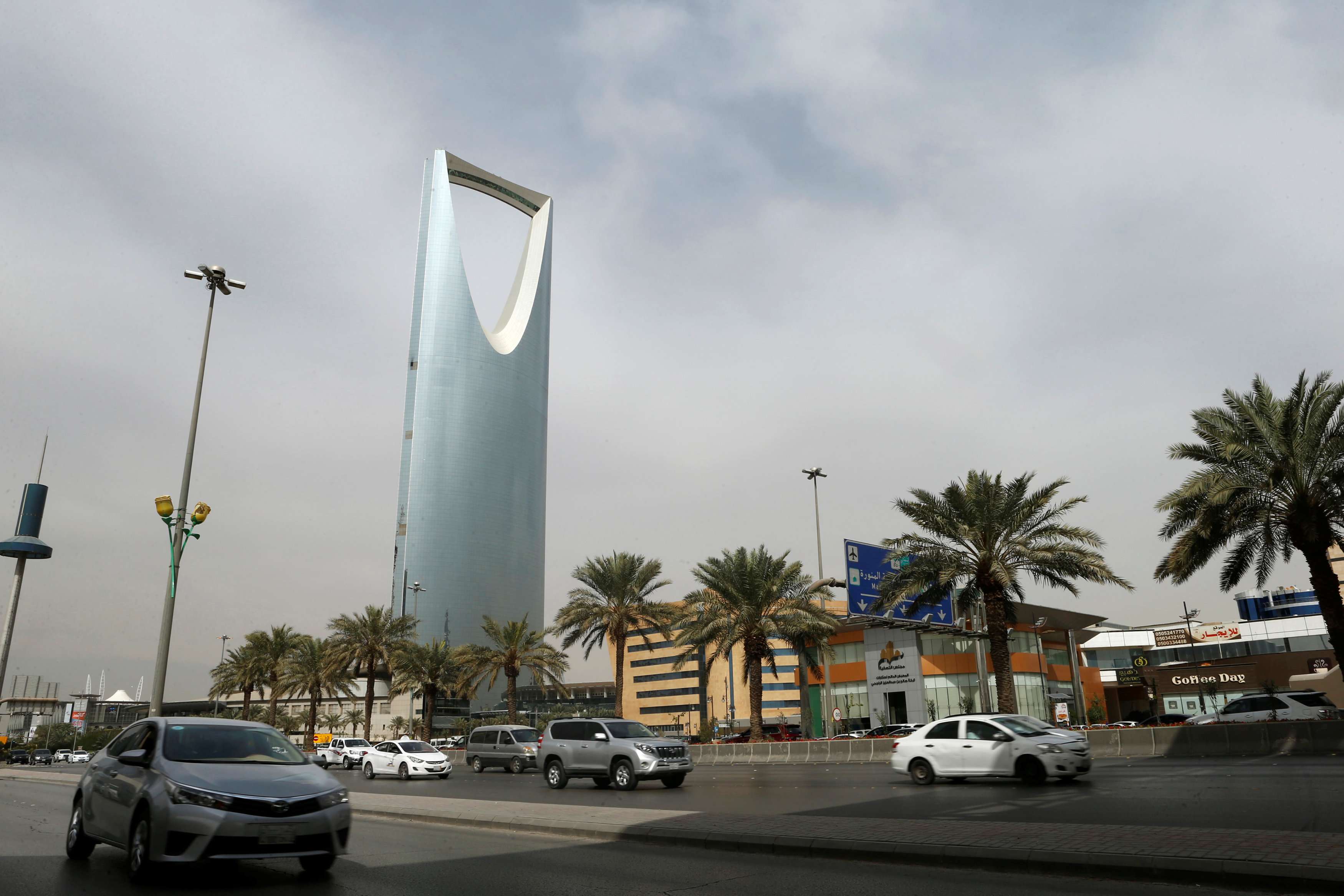 Cars drive past the Kingdom Centre Tower in Riyadh, Saudi Arabia, January 30, 2018.
