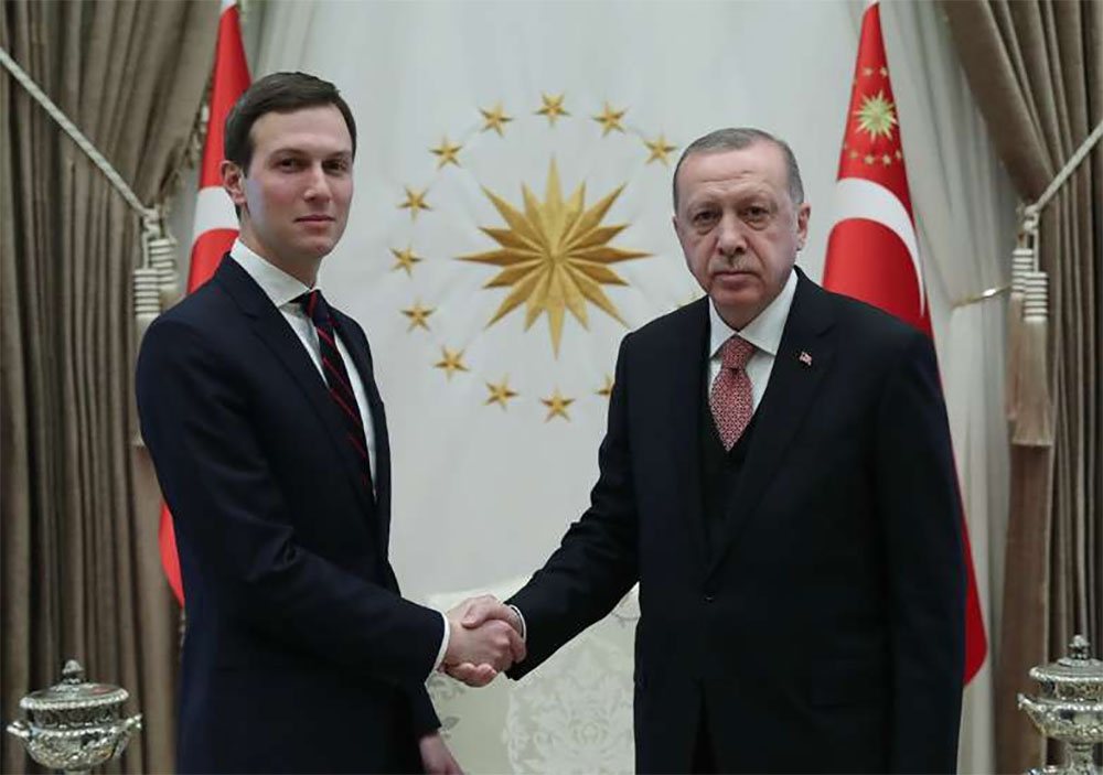 Turkish President Recep Tayyip Erdogan (R) shakes hands with Jared Kushner