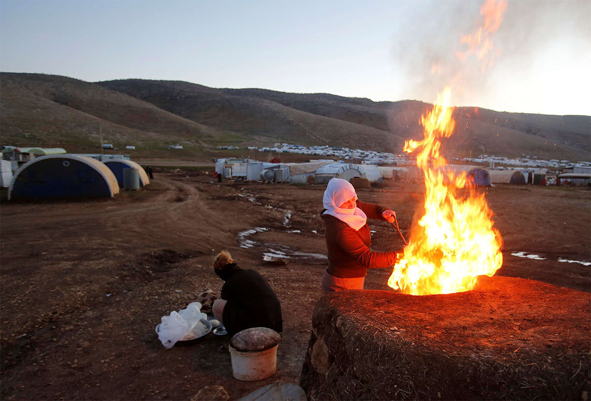 Some 2,500 families still live in the tents that are scattered along the hills of Sinjar mountain