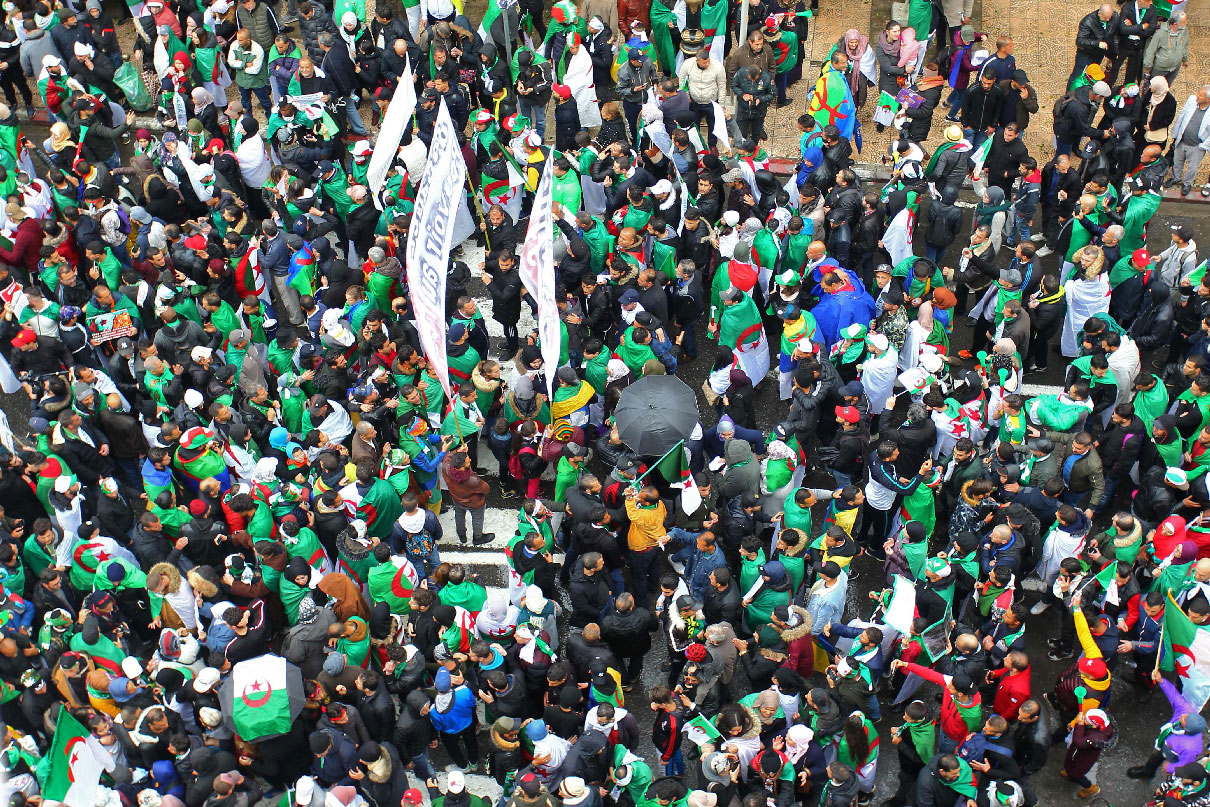 Algerians take part in a demonstration against ailing President Abdelaziz Bouteflika's bid for a fifth term on March 22, 2019, in the capital Algiers.