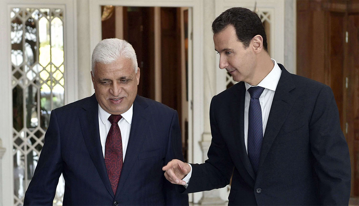Iraq's national security adviser Faleh Fayyadh with Syrian President Bashar Al Assad