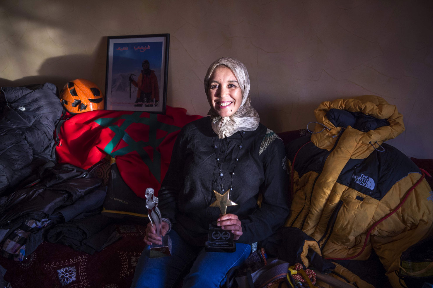 Moroccan mountaineer Bouchra Baibanou is pictured in her home with her trophies in the Sidi Moussa district of Sale near Rabat on November 29, 2018.