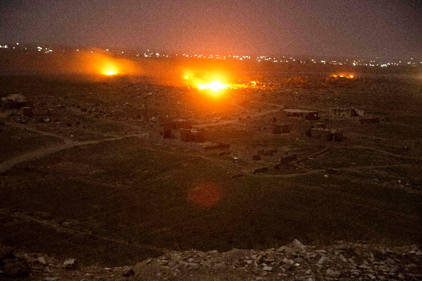 Islamic State militant positions are ablaze in Baghouz, Syria.