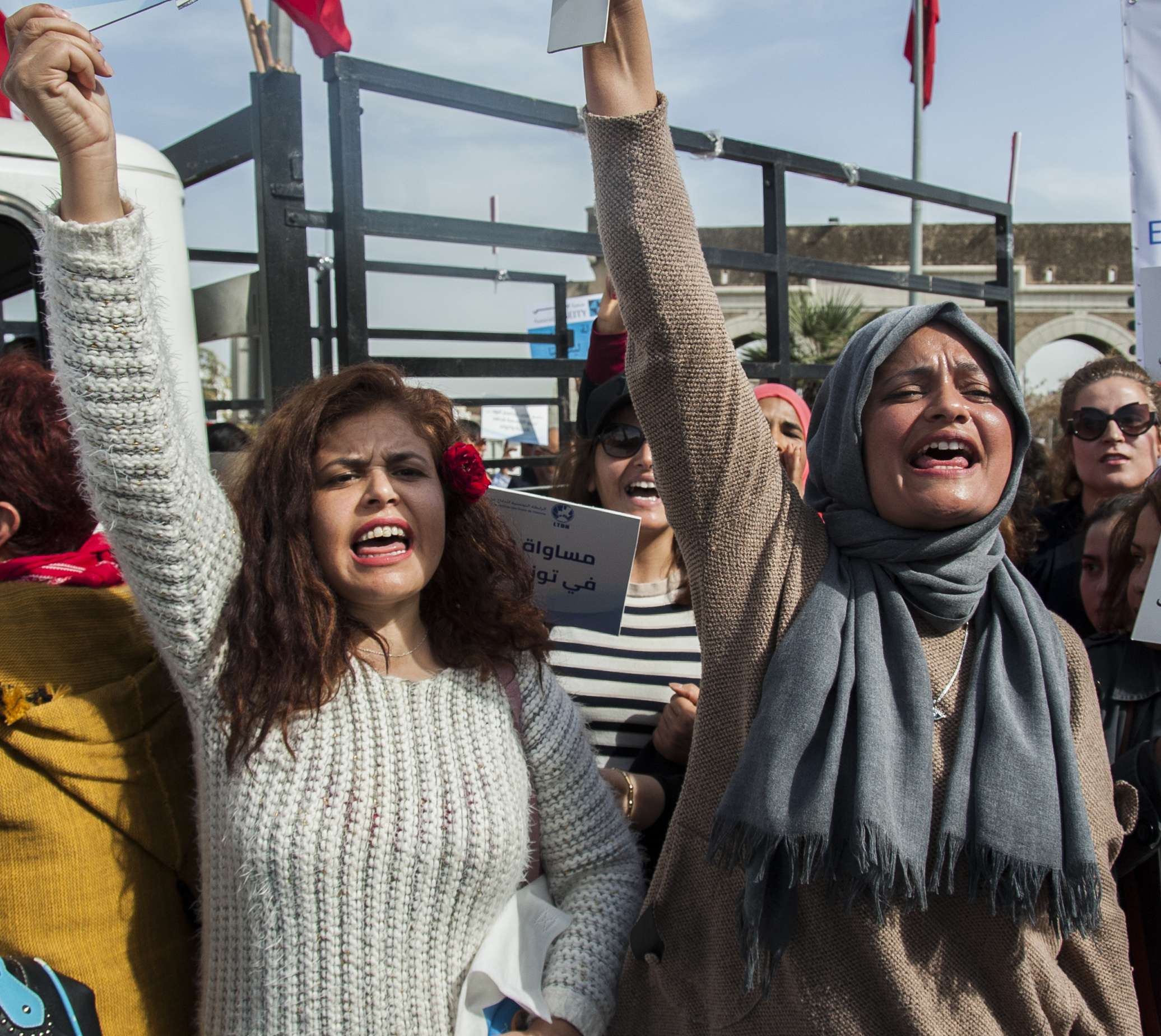 Tunisian women shout during a protest to ask for equality between men and women in Tunis, Tunisia, Saturday, March 10, 2018.