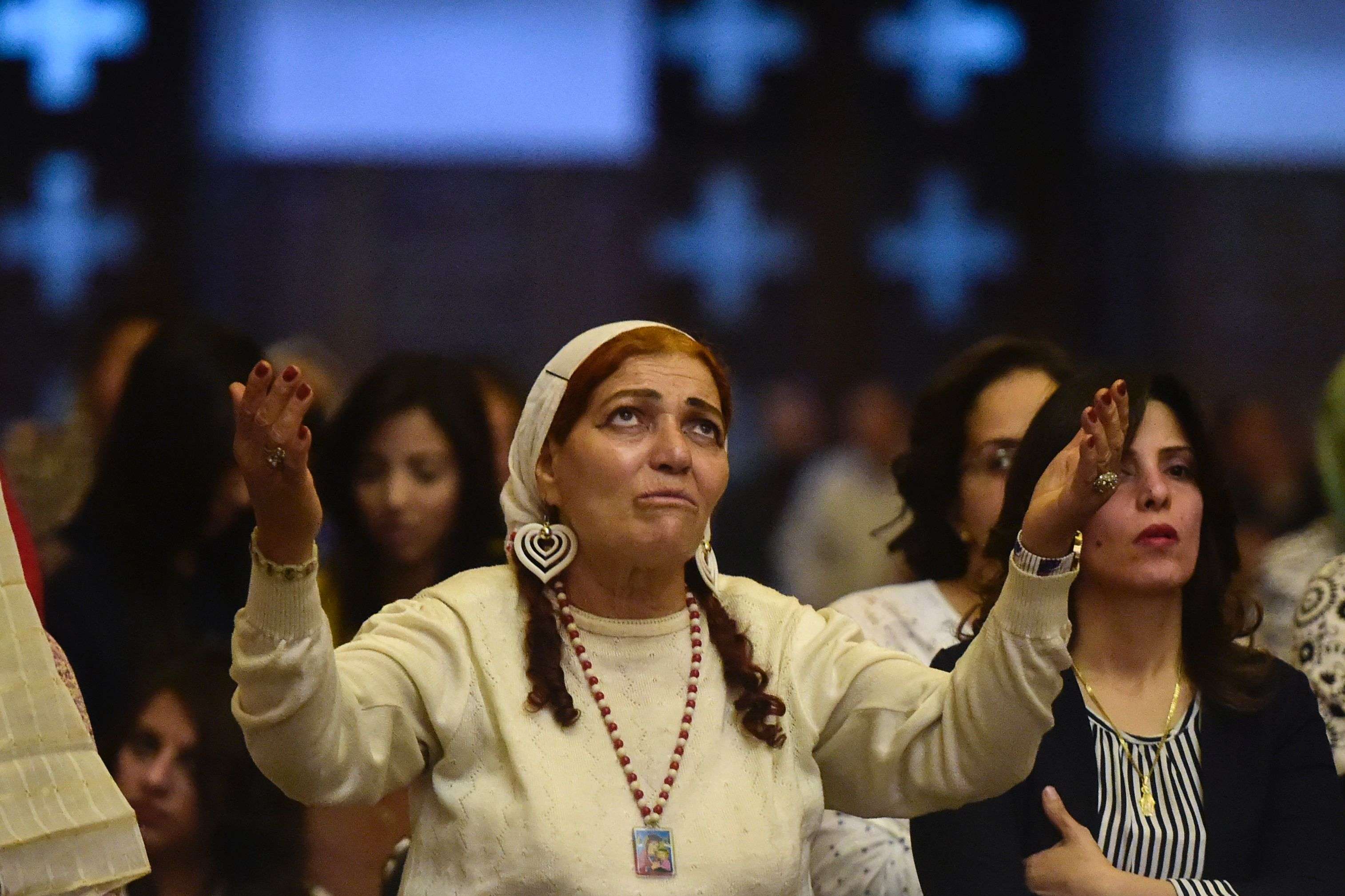 Egyptian women take part in an Easter mass