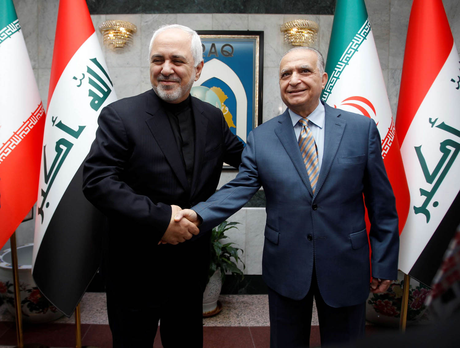 وزير الخارجية الإيراني محمد جواد ظريف يزور نظيره العراقي محمد علي الحكيم في بغداد
