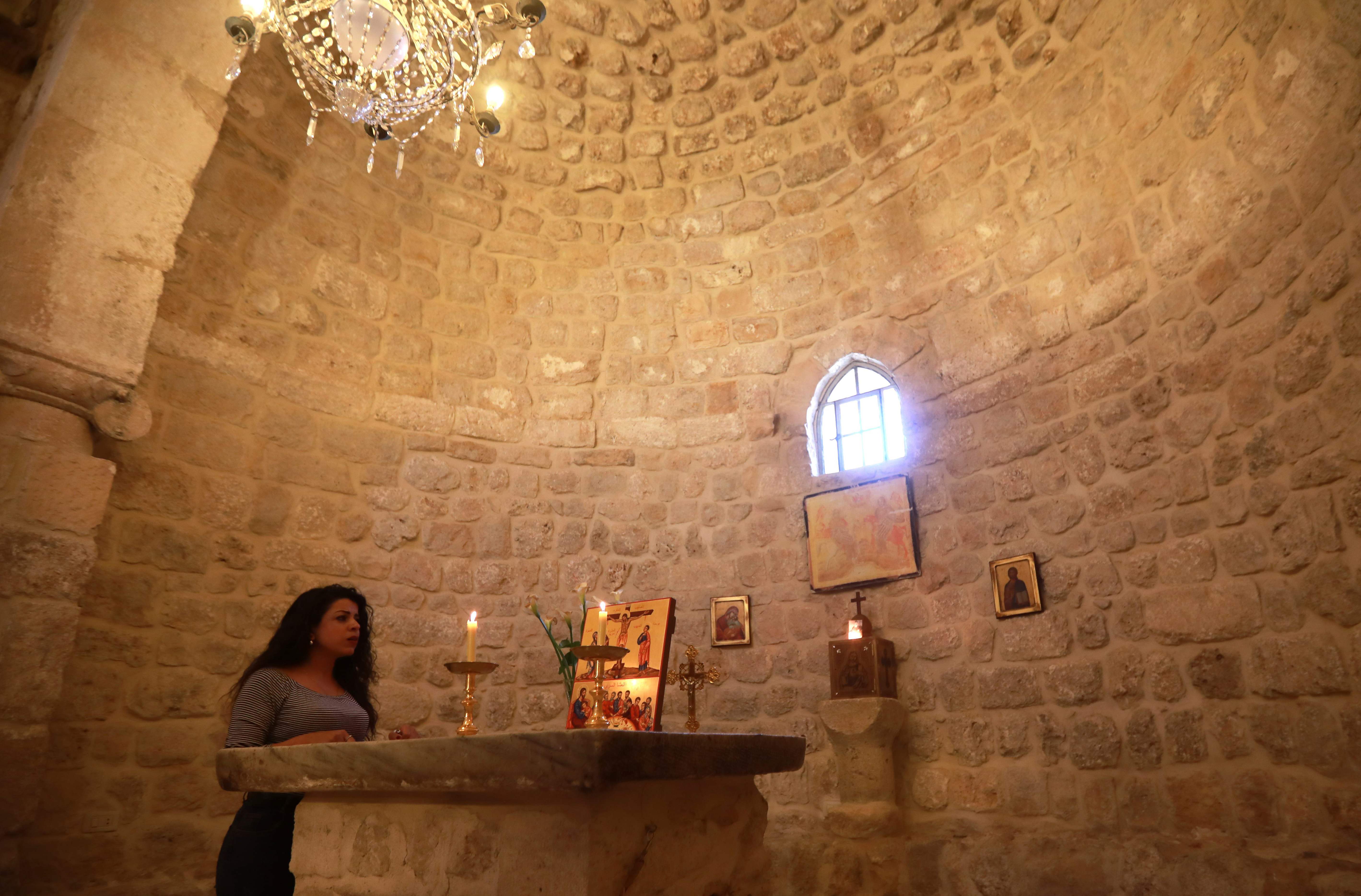 Rita Wahba recites hymns in Aramaic, at the Saint Sarkis monastery