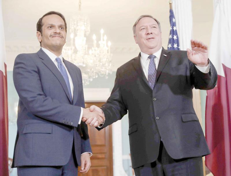 US Secretary of State Mike Pompeo (R) and Qatari Foreign Minister Sheikh Mohammed bin Abdulrahman al-Thani at the State Department in Washington