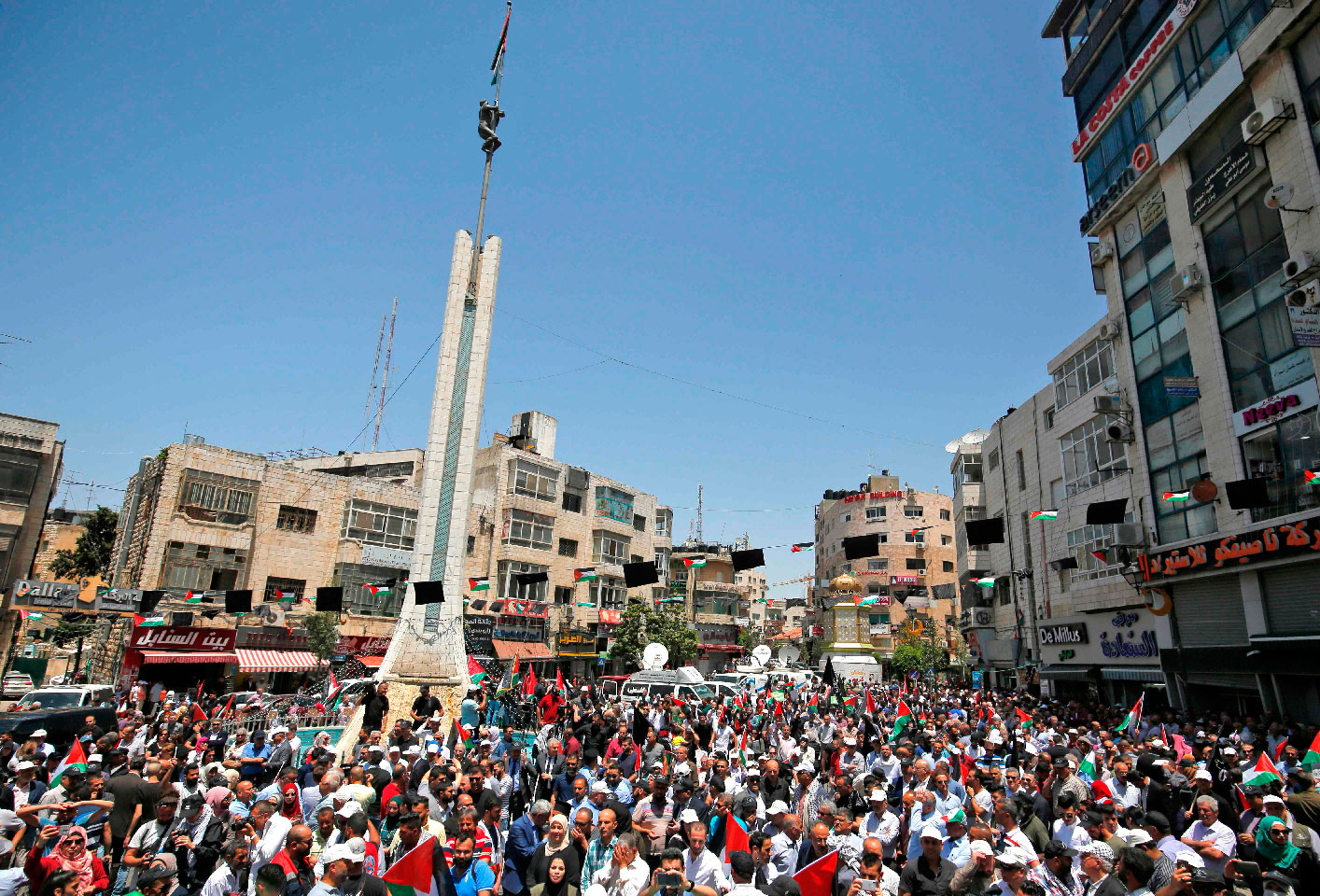 Palestinian demonstrators attend a rally marking the Nakba in Ramallah