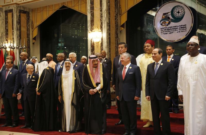 Leaders of Islamic countries pose for a group picture ahead of Islamic Summit of the Organization of Islamic Cooperation (OIC) in Mecca, Saudi Arabia, early Saturday, June 1, 2019