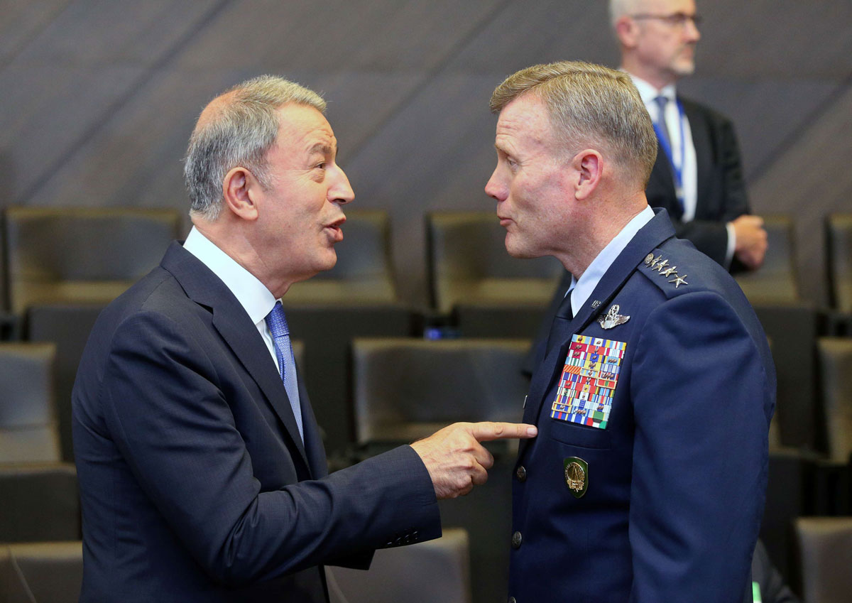 Turkish Defence Minister Hulusi Akar (L) and Supreme Allied Commander Europe US Air Force General Tod Wolters