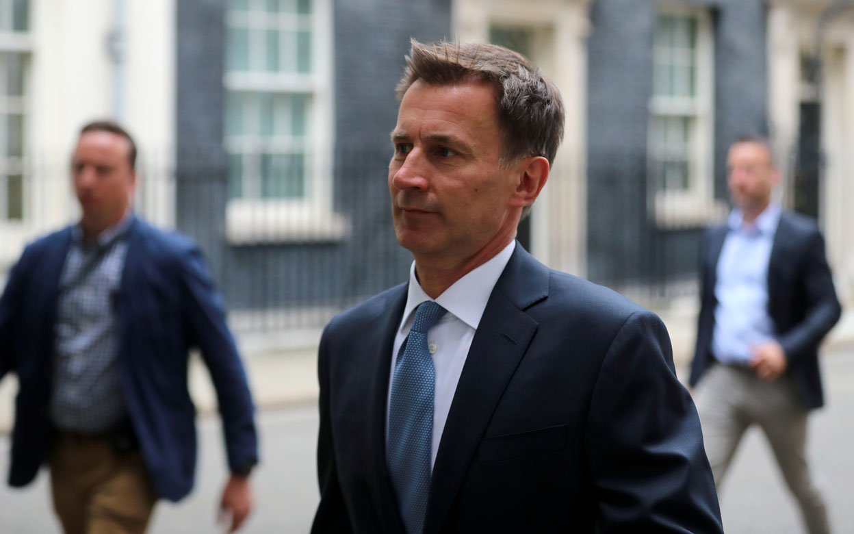 Britain's Foreign Secretary Jeremy Hunt is seen outside Downing Street in London