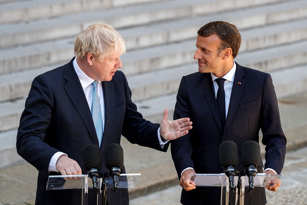 رئيس وزراء بريطانيا بوريس جونسون والرئيس الفرنسي ايمانويل ماكرون