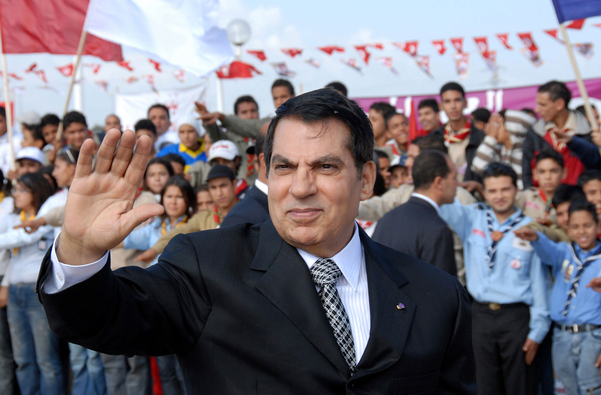 Zine El Abidine Ben Ali waves to supporters in Rades before celebrations marking the 20th anniversary of his presidency on Nov. 7, 2007