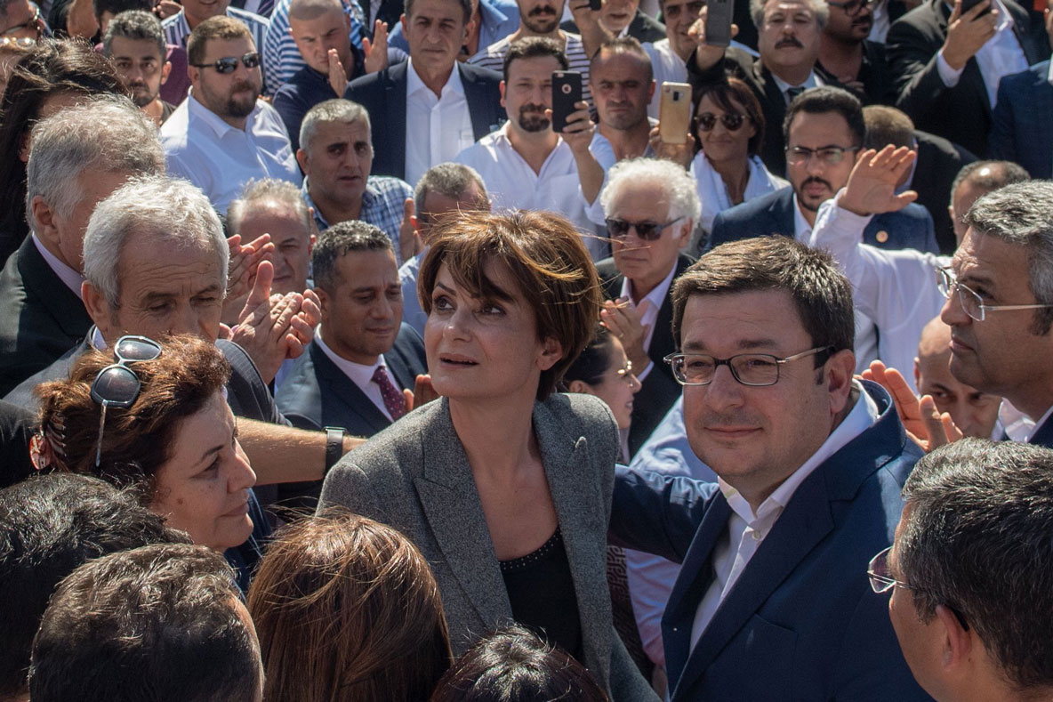 Republican People's Party (CHP) Istanbul Provincial Chair Canan Kaftancioglu (C) leaves the Caglayan court house in Istanbul