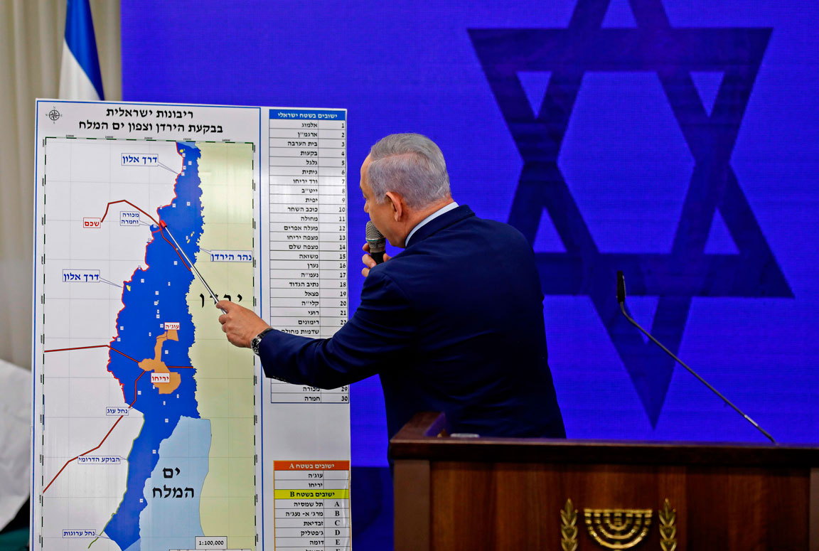 Netanyahu points at a map of Palestine's Jordan Valley