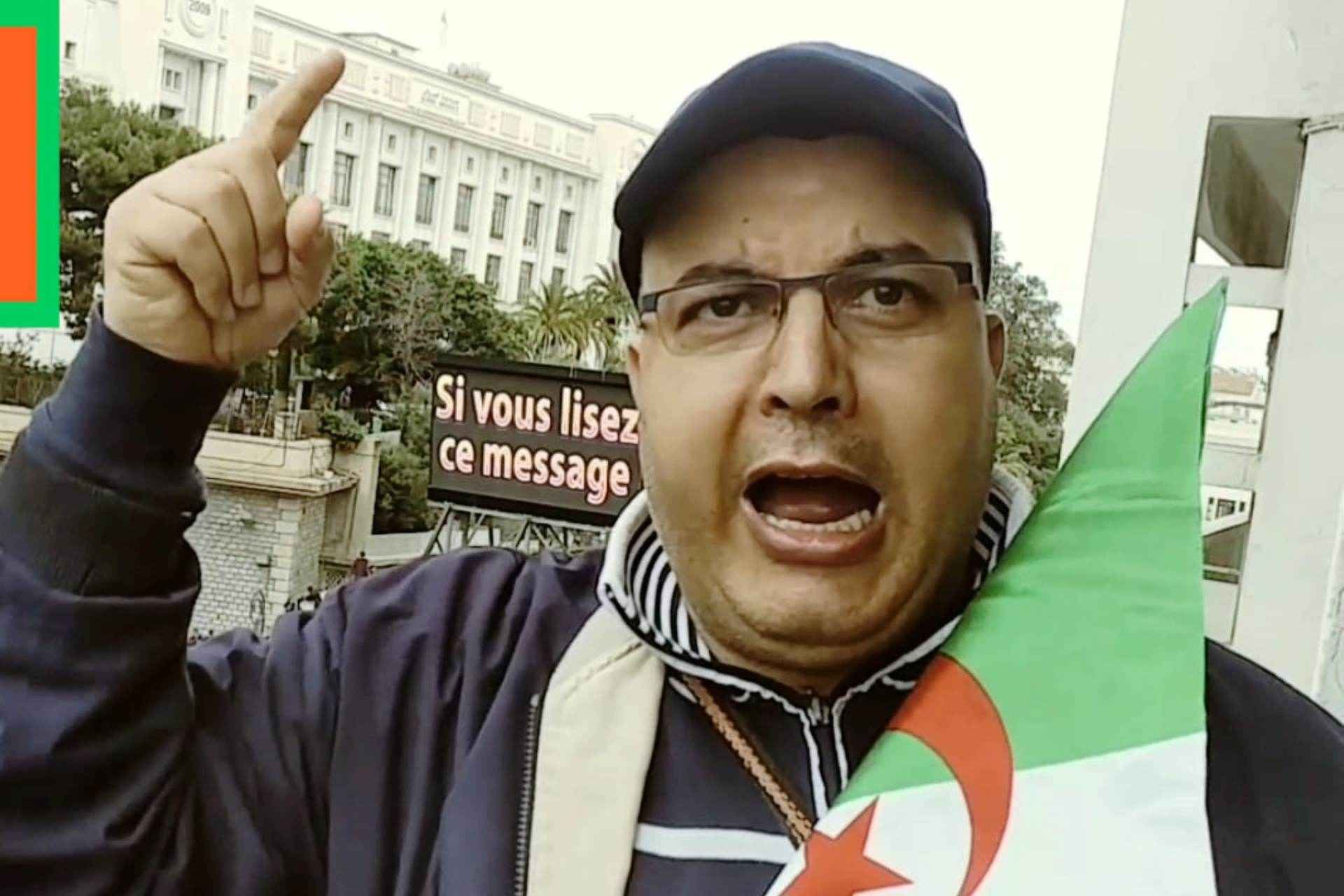 Opposition activist Fodil Boumila attends a protest in Algiers