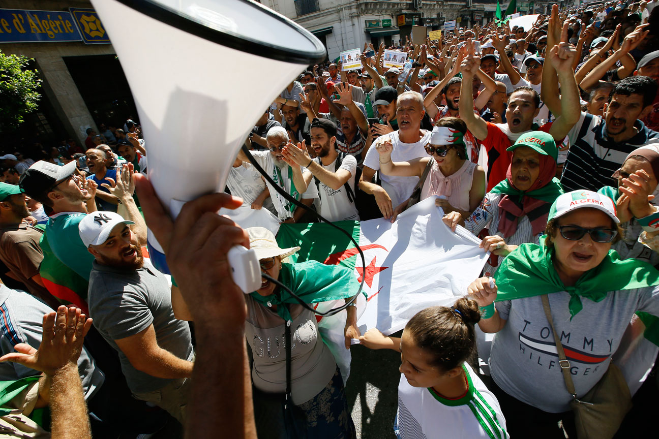 Algerians invade the streets during a demonstration in Algiers