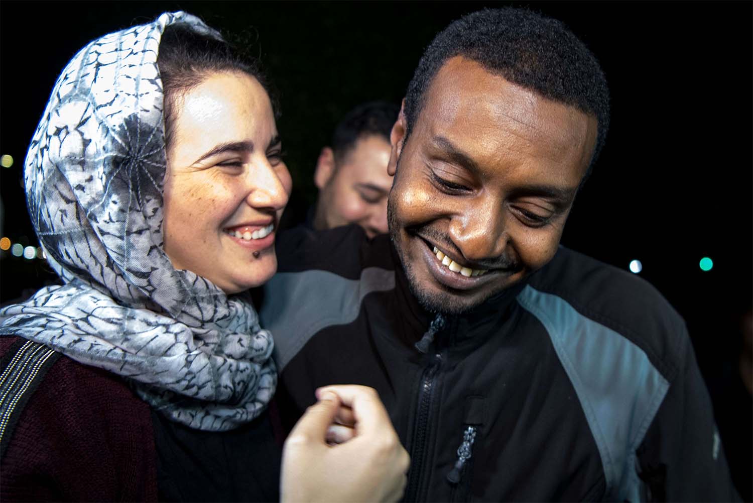 Moroccan journalist Hajar Raissouni (L) is greeted by her boyfriend Rifaat Al Amine upon leaving a prison in Sale