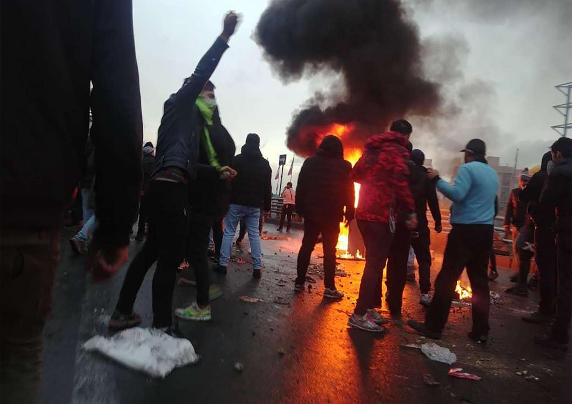 In Tehran protesters were seen blocking a road while elsewhere in the capital demonstrators gathered around a burning vehicle.