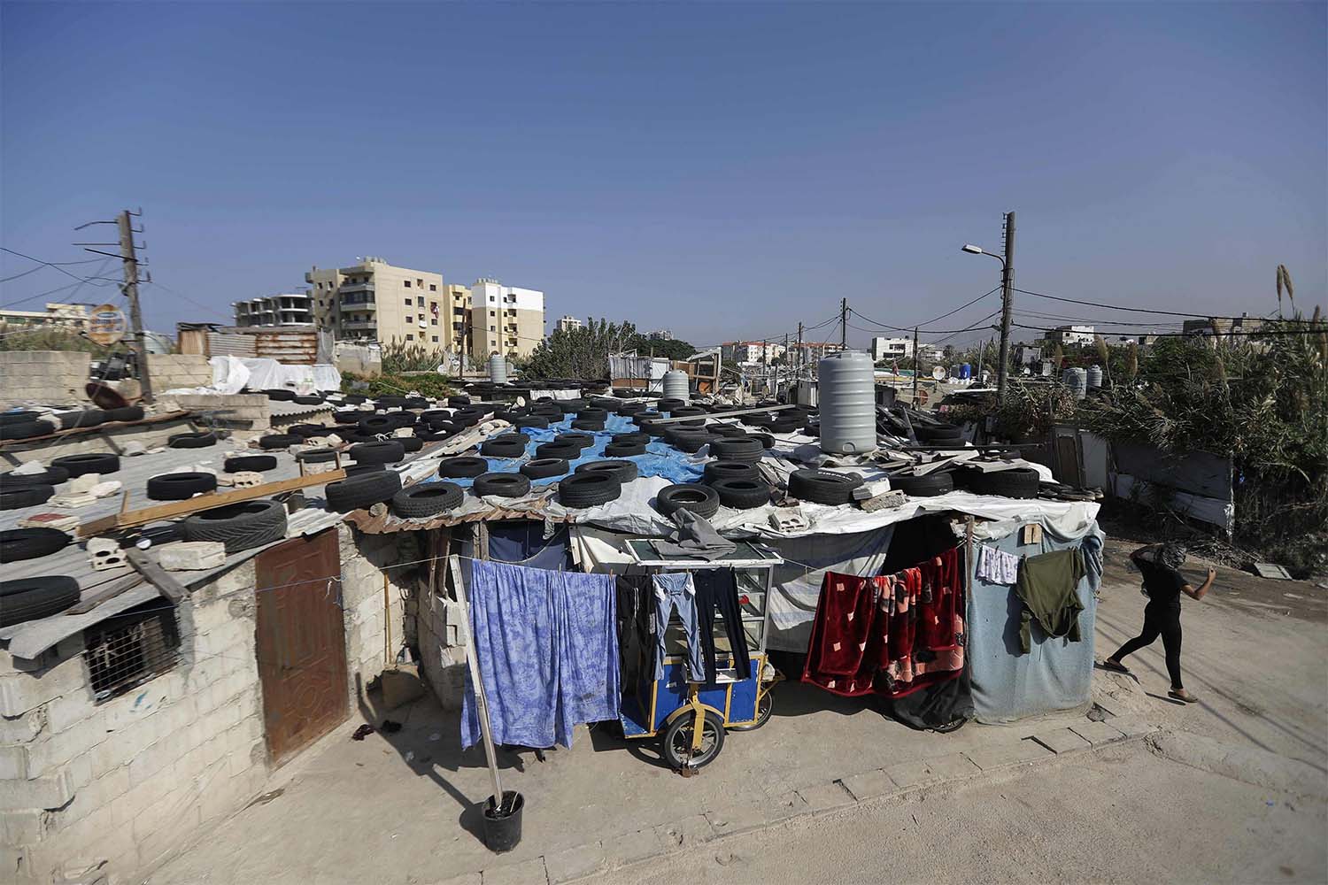 Makeshift houses are pictures in an empoverished neighbourhood in al-Mani area of the port city of Tripoli
